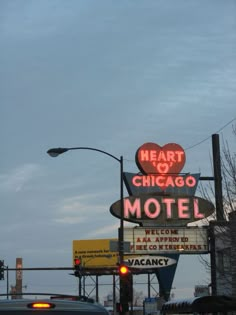 the heart of chicago motel sign is lit up