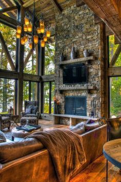 a living room with couches and a fireplace