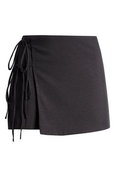 A solid hue amps up the versatility of a wrap miniskirt secured by twin ties at the side. True wrap style with side tie closure 100% polyester Dry clean Imported Tie Up Skirts, Wrap Skirt Short, Side Tie Skirt, Wrap Skirt Outfit, Chiffon Mini Skirt, Black Miniskirt, Black Wrap Skirt, Short Wrap Skirt, Mini Skirt Summer