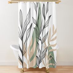 a shower curtain with leaves on it and a white bath tub in the foreground