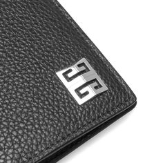 Givenchy offers a modern aesthetic with the 6CC Card Holder. Designed with genuine black leather, the accessory is detailed with three card slots upon each side and one flat pocket. Distinct Givenchy branding is printed in a contrasting tone, completing the wallet’s design. DUE TO THE NATURE OF THIS PRODUCT, ALL SALES ARE FINAL. THIS ITEM IS NOT ELIGIBLE FOR DISCOUNTS OR SPECIAL PROMOTIONS. Calfskin leather 6 Card slots Printed branding Made in Italy Style No: BK608MK18A001 Luxury Black Card Holder With Logo Plaque, Luxury Black Card Holder With Engraved Logo, Givenchy Card Holder, Luxury Black Card Holder With Card Slots, High-end Black Rectangular Wallet, Heron Preston, New Mobile, Video App, Air Jordan 1 Low