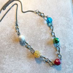 Beautiful rainbow multicolored beaded necklace! This piece of jewelry is 34 inches long and does not have a clasp but will fit over your head. Bright Jewelry, Beautiful Rainbow, Silver Chain Necklace, Silver Necklaces, Silver Chain, Beauty Book, Beaded Necklace, Rainbow, Jewelry Necklaces