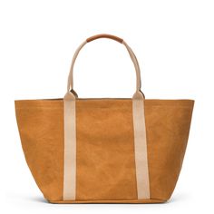 Designed with convenience in mind, our best selling Giulia tote is an ideal accessory for daily use: easy to transport, comfortably carried and robust enough for any adventure. It combines timeless style with the dependable features of a classic tote. Washable Paper, Pool Bags, Carryall Tote, Market Tote, Beach Cottage, Shopper Tote, Day Bag, Basic Colors, Vegetable Tanned Leather