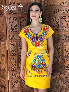 Want to match with your mini me? This Beautiful Women's and Girl's Mexican Kimono Dress is perfect for matching at a special event or just for fun! The price listed includes one adult size dress and one child's size dress. Yellow Embroidered Dresses For Festive Occasions, Yellow Embroidered Fitted Dress, Cotton Short Sleeve Fiesta Dress, Yellow Embroidered Short Sleeve Dress, Cotton Short Sleeve Dress For Fiesta, Short Sleeve Cotton Dress For Fiesta, Festive Short Sleeve Mini Dress For Summer, Yellow Short Sleeve Dress For Festive Occasions, Festive Yellow Dress With Short Sleeves