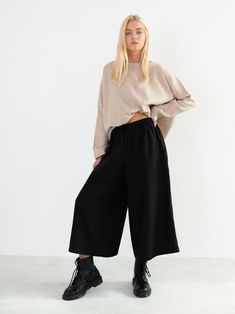 "JAYDEN is a high waist linen culottes. Style with BEE linen top https://www.etsy.com/listing/657832239/bee-linen-top-simple-linen-blouse-loose DETAILS - Cropped length - Side seam pockets - Wide leg - Elasticated waist - 100% lightweight European linen fabric - Cut and sewn to order just for you in our studio COLOR - Black, you can also choose other colors above - Fabric samples are available here https://www.etsy.com/listing/586569696/linen-fabric-samples SIZING & FIT - Relaxed fit - Lengt Wide-leg Pants For Daywear In Fall, Wide-leg Pants For Fall Daywear, Fall Wide Leg Pants With Elastic Waistband For Daywear, Black Wide Leg Pants For Spring Daywear, Wide Leg Pants For Fall Daywear, Fall Wide Leg Pants For Daywear, Black Wide-leg Bottoms For Daywear, Black Wide Leg Bottoms For Daywear, Black Linen Pants For Fall