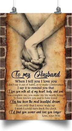 a brick wall with two hands holding each other and the words to my husband on it