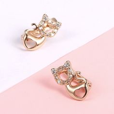 Introducing our gorgeous 14k gold kitty cat earrings, completely adorned with twinkly cubic zirconia crystals. Simple, timeless, delicate and elegant - a purrrrrrfect gift for any cat lover! Specifications Material: 14k gold plate & cubic zirconia Earring Size: approx 12mm x 7mm. Nickel Free, Hypoallergenic Delivery We provide secure checkout using PayPal, MasterCard and/or Visa, and Buyer Protection Guarantee on every product ordered! All deliveries are also tracked and insured for your peace of mind. Shiny Earrings, Friends Gifts, Animal Earrings, Cubic Zirconia Earrings, Cat Jewelry, Zirconia Earrings, Cat Earrings, Earrings Collection, Kitty Cat