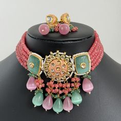 MintPink Rajwadi Jaipuri Kundan meenakari necklace, Indian wedding Jewelry, Bridal jewelry pakistani Jewelry Regular Size And Adjustable Meenakari necklace Rajwadi Necklace Set Ships from California in 1 business day and delivery within 2-5 business days in the USA. This is 100% Handmade jewelry. So Color, shades, and texture displayed may vary slightly from the actual product due to digital image limitations. We request you consider these minor variations. Please expect the possibility of some slight imperfections when buying handmade jewelry. If you have any questions, please message or email us. Arrives in a gift box. Thank you so much for visiting my shop. Cheap Meenakari Jewelry For Wedding, Cheap Meenakari Jewelry For Festive Occasions, Kundan Necklaces For Eid Gifts, Eid Gift Kundan Necklaces, Traditional Pink Necklace For Gift, Traditional Pink Necklaces For Gifts, Round Kundan Necklace With Meenakari As Gift, Pink Meenakari Necklaces For Festive Occasions, Traditional Pink Jewelry Sets For Gifts