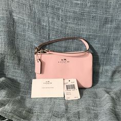 “Petal” Pink Crossgrain Leather Silver Hardware Inside Multifunctional Pockets Approx 6 1/2” W X 4” H Strap Attached 5 1/2” L Coin Logo, Purple Clutch, Coach Clutch, Black Wristlet, Bags Coach, Black Clutch, Coach Leather, Leather Wristlet, Leather Silver