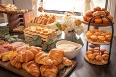 an assortment of pastries and desserts on a table