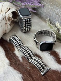 Fits Apple Watchband Series 3, 4, 5, 6, 7, 8,9 and SE (Size: 38mm, 40mm, 41mm, 42mm, 44mm, and 45mm) 2 Size options (Small: 38mm, 40mm, and 41mm) (Large: 42mm, 44mm, and 45mm) 3 Bubble shape options (Oval) (Double) (Dot) Ideal fit for 6 inch + wrist circumference Sturdy highly elastic band for optimal fit  Avoid water contact for longer product life Modern Silver Apple Watch Band For Everyday Use, Adjustable Silver Apple Watch Band, Adjustable Silver Apple Watch Band For Everyday Use, Silver Adjustable Watch Bands For Everyday Use, Series 3, Apple Watch Series, Watch Bands, Apple Watch, Jewelry Watches