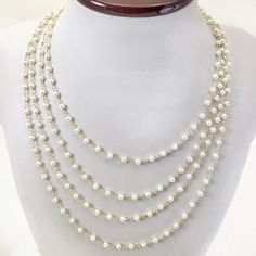 ✦Gemstone: Freshwater Pearl ✦Color: White  ✦Bead Size: 3mm ✦Shape: Round  ✦Closure: Lobster Claw ✦Chain Length: 15''- 72'' ✦QTY: 1 pc / package Elevate your look with our exquisite Gold Plated Pearl Necklace, featuring a delicate freshwater pearl pendant on a dainty gold-plated chain. Handmade with care and attention to detail, this necklace exudes elegance and sophistication, making it the perfect accessory for any occasion. ⁕Gold Plated Pearl Necklace with freshwater pearl pendant ⁕Dainty handmade chain for a minimalist and elegant look ⁕Customizable length for versatility and comfort ⁕Thoughtfully crafted for women who appreciate timeless beauty PLEASE NOTE: ▪️ Please feel free to contact us if you have any questions or special requests. We're here to assist you and ensure you have a wo Pearl White Metal Jewelry With Adjustable Chain, Wire Wrapped Pearl Necklace In Gold, Round Pearl Chain Jewelry, Pearl White Pearl Jewelry With Chain, Pearl Jewelry With Delicate Chain And Round Beads, Pearl White Long Necklace With Clavicle Chain, Pearl Clavicle Chain Jewelry With Round Beads, Pearl Clavicle Chain With Round Beads, Wire Wrapped Pearl Jewelry With Round Beads