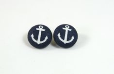 pair of navy blue and white anchor earrings