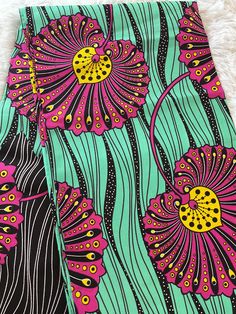 This green and pink African Fabric is high quality African print made from 100% cotton and it's 45 inches wide. It is used for making African Clothing, African quilts, & For Home decoration. FYI: Print is Double sided. Each piece of fabric measures:  1/4 Yards (9 inches by 44inches) FAT QUARTERS( 18 inches by 22 inches) 1/2 yards(18 inches by 44 inches) 3/4 Yards (27inches by44inches) 1Yard(36 inches by 44 inches) 1 1/4 Yards (45 inches by 44 inches) 1 1/2 inches(54 inches by 44 inches) If you p Green Bohemian Cotton Patterns, Colorful Green Ankara Fabric, Green Ankara Fabric With Colorful Pattern, Green Cotton Fabric With Floral Print, Green Floral Print Cotton Fabric, Green Printed Ankara Fabric, Sunroom Inspiration, African Headwrap, African Quilts