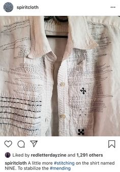 a white shirt with black designs on it