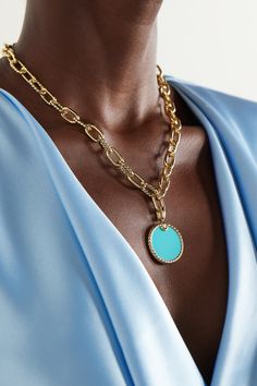 David Yurman's 'Elements' pendant celebrates eternity and the timeless quality of the circle. It's made from 18-karat gold that winds with artful fluting to frame a turquoise disc. Elegant Blue Circular Jewelry, Elegant Turquoise Jewelry With Adjustable Chain, Elegant Turquoise Necklace With Detachable Pendant, Luxury Turquoise Oval Pendant Necklace As Gift, Elegant Blue Necklace With Coin Pendant, Elegant Turquoise Jewelry With Large Pendant, Luxury Round Turquoise Necklace, Blue Coin Pendant Jewelry, Luxury Kingman Turquoise Oval Necklaces