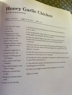 an open recipe book with instructions for making honey garlic chicken on it's side