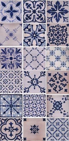 blue and white tiles with different designs on them