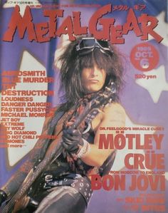 the cover of metal gear magazine featuring an image of a man with long hair holding a guitar