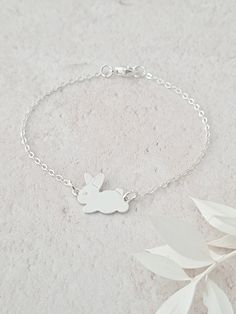 Silver plated rabbit bracelet.  This bracelet has a silver plated bunny/rabbit charm hanging from a silver plated fine chain.  Makes a great bridesmaid gift and can be worn every day on its own or with many bracelets. If you want this bracelet personalised, you can purchase a disc from my Add on section in this shop. This bracelet will arrive in a bag ready for giving. This item ships from the UK within 1 working day. Bunny Bracelet, Bunny Jewelry, Rabbit Jewelry, Rabbit Charm, Gifts Bridesmaid, Pet Rabbit, Bridesmaid Bracelet, Organza Bags, Bridesmaid Gift