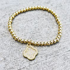 Durable and stylish, our waterproof bracelet is crafted for both functionality and fashion. Perfect for any occasion, it's the ideal accessory for those who appreciate durability and timeless elegance. Perfect for the minimalist and a beautiful piece to layer with. A true versatile statement piece that you can wear straight from the pool to dinner! - 18K gold plated / stainless steel - Waterproof technology - Elastic bracelet measures 56mm inner diameter. Luxury Adjustable Flexible Bracelets, Luxury Flexible Adjustable Bracelets, Modern Adjustable Hypoallergenic Charm Bracelet, Elegant Hypoallergenic Metal Beaded Bracelets, Elegant Hypoallergenic Charm Bracelet, Trendy Adjustable Tarnish Resistant Bracelets, Trendy Flexible Bracelets As Gift, Trendy Flexible Bracelets For Gifts, Trendy Adjustable Tarnish-resistant Bracelets