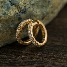 11 mm huggie earrings made in 14k or 18k yellow gold and set with clear diamonds. In this listing, you can see the earrings in YELLOW GOLD, you can order in white or rose gold from this listing as well. You can see and order the different colors from the following links as well. ● Rose gold - https://www.etsy.com/listing/861029667/11mm-huggie-earrings-14k-18k-rose-gold?ref=shop_home_active_13&frs=1 ● White gold - https://www.etsy.com/listing/861020763/11mm-huggie-earrings-14k-18k-white-gold? Luxury Rose Gold Huggie Jewelry, Classic Diamond Earrings, Earrings Diamonds, Wedding Ring Sets Unique, Gold Huggies, Diamonds Earrings, Huggie Earring, Diamond Gift, Huggie Earrings