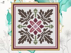 a cross - stitch pattern with flowers and leaves in the center on a white background