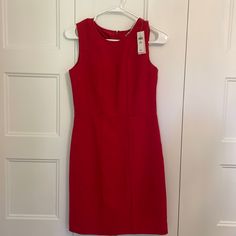 New With Tags Never Worn Zip Up Back Dress Red Midi Workwear Dress, Red Midi Dress For Work, Red Sleeveless Knee-length Dress For Work, Red Knee-length Sleeveless Dress For Work, Red Sleeveless Dress For Spring Workwear, Red Sleeveless Dress For Workwear In Spring, Red Sleeveless Dress For Spring Formal, Chic Red Sleeveless Sheath Dress, Red Knee-length Workwear Dress