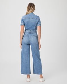 Harper is the must-have one-piece of the season. This extra wide leg ankle length jumpsuit is designed with front flap and patch pockets, buttons detailing the back sleeves, and a light indigo wash on soft and comfortable vintage-inspired denim. | Harper Ankle Jumpsuit - Rock Show Blue | Size 10 Straight Leg Jumpsuits And Rompers For Workwear In Spring, Spring Wide Leg Denim Jumpsuit With Button Closure, Spring Denim Jumpsuit With Wide Legs And Button Closure, Spring Denim Jumpsuit With Patch Pockets For Work, Spring Wide-leg Denim Jumpsuit With Button Closure, Spring Workwear Denim Jumpsuit With Patch Pockets, Wide Leg Medium Wash Denim Jumpsuit For Fall, Fall Wide Leg Medium Wash Denim Jumpsuit, Summer Wide Leg Denim Jumpsuit For Work