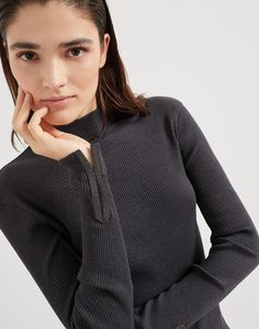 Cotton ribbed jersey top with precious cuff detail Essential, versatile and comfortable, this rib knit cotton jersey top is the perfect base to create your own outfits. The distinctive rib knitting lends a refined look to the garment, while the Precious Cuff Detail in shiny monili adds a precious touch to the sleeve edges, complementing this item with the iconic embellishment of the Brunello Cucinelli collections. Classic Stretch Tops With Ribbed Cuffs, Ribbed Knit Tops For Office, Knit Tops With Ribbing For Workwear, Knit Ribbed Tops For Workwear, Stretch Tops With Ribbed Cuffs For Work, Ribbed Knit Tops For Fall, Ribbed Tops For Workwear, Modern Winter Top With Ribbed Collar, Chic Tops For Layering With Ribbed Cuffs