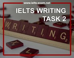 the words ielts writing task 2 are spelled by scrabbles on wood blocks