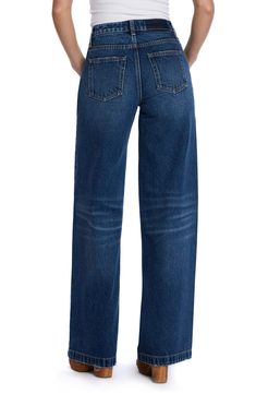 Effortlessly cool and casual-chic, these nonstretch jeans flaunt a high waist and full-length wide legs that create a dramatic silhouette. 32" inseam; 24" leg opening; 10 1/2" front rise Zip fly with button closure Five-pocket style 100% cotton Machine wash, tumble dry Imported Classic High Waist Wide Leg Pants With Five Pockets, Straight Fit Wide Leg Jeans With Belt Loops, Classic Wide Leg Flare Jeans With Five Pockets, Classic High Rise Relaxed Fit Wide Leg Pants, Classic High Rise Wide Leg Pants With Relaxed Fit, Classic High Waist Denim Wide Leg Pants, Classic Wide-leg Jeans For Fall, Classic Full Length Flare Jeans With Belt Loops, Dark Wash Wide Leg Flare Jeans