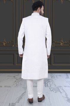 Expertly crafted, the Men's Sherwani in white presents a refined and sophisticated look. With delicate stone and thread embroidery, this Sherwani elevates your style for special occasions. Make a statement with this elegant and timeless piece. Mens Sherwani, Sophisticated Look, Thread Embroidery, Timeless Pieces, The Man, Your Style, Special Occasion, Thread, Embroidery