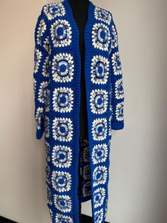 The style is customizable  This Long cardigan is for you . If you like it choose your size :) Blue Knitted Outerwear One Size, Long Blue Knitted Sweater, Blue Long Sleeve Outerwear One Size, Blue Granny Square Cardigan For Fall, Bohemian Long Sleeve Sweater Coat In Blue, Bohemian Long Sleeve Blue Sweater Coat, Bohemian Blue Long Sleeve Sweater Coat, Fitted Crochet Blue Cardigan, Fitted Blue Crochet Cardigan