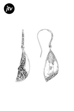 Introducing the Sterling Silver Hammered Earrings from our exclusive Artisan Collection of Bali���! These unique earrings are handcrafted with meticulous detail, featuring a stunning oxidized finishing technique that adds depth and character to each piece. The sterling silver material shines beautifully, making these earrings versatile for everyday wear or special occasions. With dimensions of 1.62 inches in length and 0.42 inches in width, they make a bold yet elegant statement on your ears. Th Elegant Engraved Metal Earrings, Artistic Oxidized Finish Jewelry, Elegant Metal Earrings With Oxidized Finish, Ornate Teardrop Earrings With Oxidized Finish, Elegant Oxidized Metal Earrings, Elegant Sterling Silver Earrings With Oxidized Finish, Elegant Oxidized Sterling Silver Earrings, Elegant Oxidized Finish Drop Earrings, Elegant Silver Earrings With Oxidized Finish