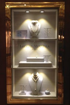 a display case filled with lots of jewelry