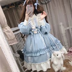 Brand Name: IngvnSilhouette: A-LINEOrigin: CN(Origin)Season: SpringNeckline: MANDARIN COLLARSleeve Style: Flare SleeveDecoration: BowStyle: Lolita StyleDresses Length: Knee-LengthMaterial: COTTONMaterial: PolyesterAge: Ages 18-35 Years OldSleeve Length(cm): FullGender: WOMENWaistline: empirePattern Type: PatchworkModel Number: Y658Style: Sweet Cute Kawaii Lolita Princess dressPopular elements: Ruffles,three-dimensional decoration,stitchingFabric material: Chiffon / Polyester (Polyester Fiber)Season: 2020 Spring NewColor: Blue And CoffeeSize: M,LNote1: Dress + Bow On Chest + Bear DollNote2: No Headdress + rabbit bag + socks + shoes Harajuku Style Cosplay Dress For Spring, Spring Harajuku Cosplay Dresses, Spring Cosplay Dress With Doll Collar, Kawaii Ruffled Costume Dress, Kawaii Ruffle Costume Dress, Harajuku Style Long Sleeve Costume Dress, Blue Kawaii Party Dresses, Ruffled Dress For Spring Cosplay, Spring Ruffle Dress For Cosplay