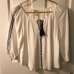 White Blouse With Navy And Red Embroidery. Great Condition. Never Worn! Took The Tags Off And It Just Didn't Fit Me Right!. 15% Off Bundle Of 2+ Items. Will Accept Offers Forever 21 Blouse For Vacation, Forever 21 White Blouse For Spring, Bohemian Spring Blouse From Forever 21, Casual White Blouse By Forever 21, Forever 21 Bohemian Top For Vacation, Casual Embroidered Tops From Forever 21, Forever 21 Long Sleeve Blouse For Spring, Forever 21 Long Sleeve Tops For Summer, Forever 21 Casual White Blouse