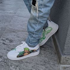 The One Piece Sauron Green Dragon Custom Air Force 1 is a stylish and comfortable sneaker with a unique custom design. It features a green dragon-patterned upper with intricate detailing, a white midsole, and green laces for added contrast. Together, these features create a striking combination of fashion and function. Exactly as shown in the pictures. 📷 Brand New & Authentic. 💯 Hand Painted with attention to detail. 👨‍🎨 Waterproof and Flexible. ❤️ Unisex model. Please refer to the Size Chart. 👟👫 Free Worldwide Shipping. ✈️🌍 Custom Green Low-top Sneakers, Custom Green Sneakers For Streetwear, Custom Green Sneakers With Round Toe, Custom Green High-top Sneakers, Custom Green Lace-up Sneakers, Dragon Custom, Painted Sneakers, Air Force 1 Custom, Custom Air Force 1