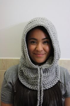 This is a hooded scarf cowl color Brilliant Gray. This is perfect for the fall and winter season. Made from acrylic yarn and love. All items are hand made and can ship within 7 days. One Size Fall Balaclava With Hood, One Size Hooded Balaclava For Fall, One Size Cozy Hooded Balaclava, Cozy Hooded Balaclava One Size, Warm Hooded Bonnet For Cold Weather, Cozy One-size Hooded Balaclava, Yarn Bonnet For Cold Weather In Fall, Fall Yarn Bonnet For Cold Weather, Fall Cold Weather Yarn Bonnet