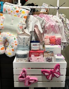 an organized baby's diaper drawer with items on it