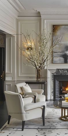 a living room filled with furniture and a fire place next to a painting on the wall