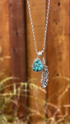 * FREE SPIRIT NECKLACE * Created with sterling silver, genuine turquoise with sterling a handcrafted sterling silver feather.  This sterling silver chain is 18 inches. The turquoise cab is .75 inches long .5 inches wide. The feather is 1.5 inches long and 3/8 inches wide  You could add more charms to this necklace if you want! This FREE SPIRIT necklace is a beautiful statement piece that you will never want to take off! You will feel like you can conquer anything while wearing it! . Bohemian Sterling Silver Charm Necklace, Turquoise Feather Jewelry As Gift, Turquoise Feather Jewelry As A Gift, Adjustable Turquoise Jewelry With Feathers, Turquoise Bohemian Jewelry With Feathers, Bohemian Turquoise Jewelry With Feathers, Feather Charms, Silver Feather, Sterling Jewelry