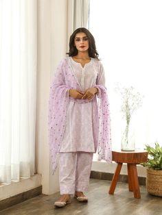 Anokhi - Lavender Mirror Embroidered Cotton Kurta Set (Set of 3) By Gulabo Jaipur now available at Trendroots Designer Purple Palazzo Set With Chikankari Embroidery, Cotton Palazzo Set With Mirror Work For Wedding, Wedding Cotton Palazzo Set With Mirror Work, Unstitched Lavender Sets For Eid, Purple Straight Kurta Sets With Gota Work, Purple Gota Work Straight Kurta Sets, Festive Lavender Sets With Mirror Work, Purple Cotton Kurta For Wedding, Wedding Cotton Palazzo Set With Gota Work