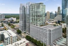 an aerial view of some very tall buildings