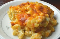 a white plate topped with macaroni and cheese