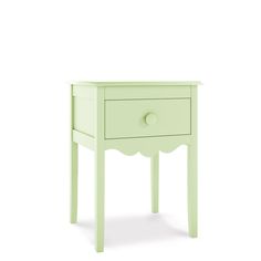 a small green table with two drawers on one side and an open drawer on the other