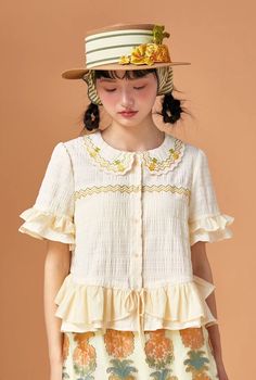 <Size>

 *Unit: cm 







 size

 shoulder width

 bust

 Sleeve Length

 Length 











 S

 36

 96

 twenty four

 53 






 M

 36

 100

 twenty four

 55 













 <Material>



 74% polyester

 Viscose 25.5%

 Spandex 0.5%






 ＜Model wearing＞



 Wearing size



 Small size




 Model Dimensions



 Height: 170cm Cute Ruffled Blouse For Summer, Cute Ruffled Summer Blouse, Cute Doll Collar Summer Blouse, Cute Doll Collar Blouse For Summer, Cottagecore Ruffle Blouse For Summer, Summer Cottagecore Blouse With Ruffles, Beige Cottagecore Blouse For Summer, Casual Short Sleeve Blouse With Ruffles, Casual Short Sleeve Ruffled Blouse