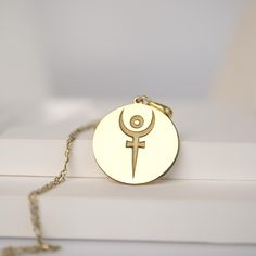 Discover this elegant gold necklace, meticulously designed to capture minimalist beauty. Featuring the symbol of Hades, this necklace is the perfect choice for mythology lovers and those who appreciate unique jewelry. Features: Material: 14K Solid Gold - 10K Solid Gold - 925K Silver - 925K Gold Filled  Design: Unique design with the symbol of Hades Uses: Ideal for everyday use, special occasions or as a thoughtful gift Packaging: Comes in a stylish gift box, ready for gift giving This necklace is not just a piece of jewelry; it is an expression of style and individuality. For a night out or adding a sophisticated touch to your everyday outfit, this necklace is a versatile accessory that complements any look. It also makes a perfect gift for birthdays, anniversaries or a special occasion, d Hades Symbol Necklace, Hades Symbolism, Hades Jewelry, Hades Symbol, Elegant Gold Necklace, Minimalist Beauty, Special Gifts For Her, Symbol Necklace, Book Jewelry