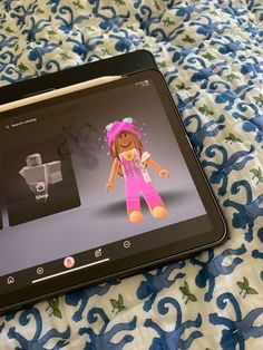 an image of a child's tablet on a bed